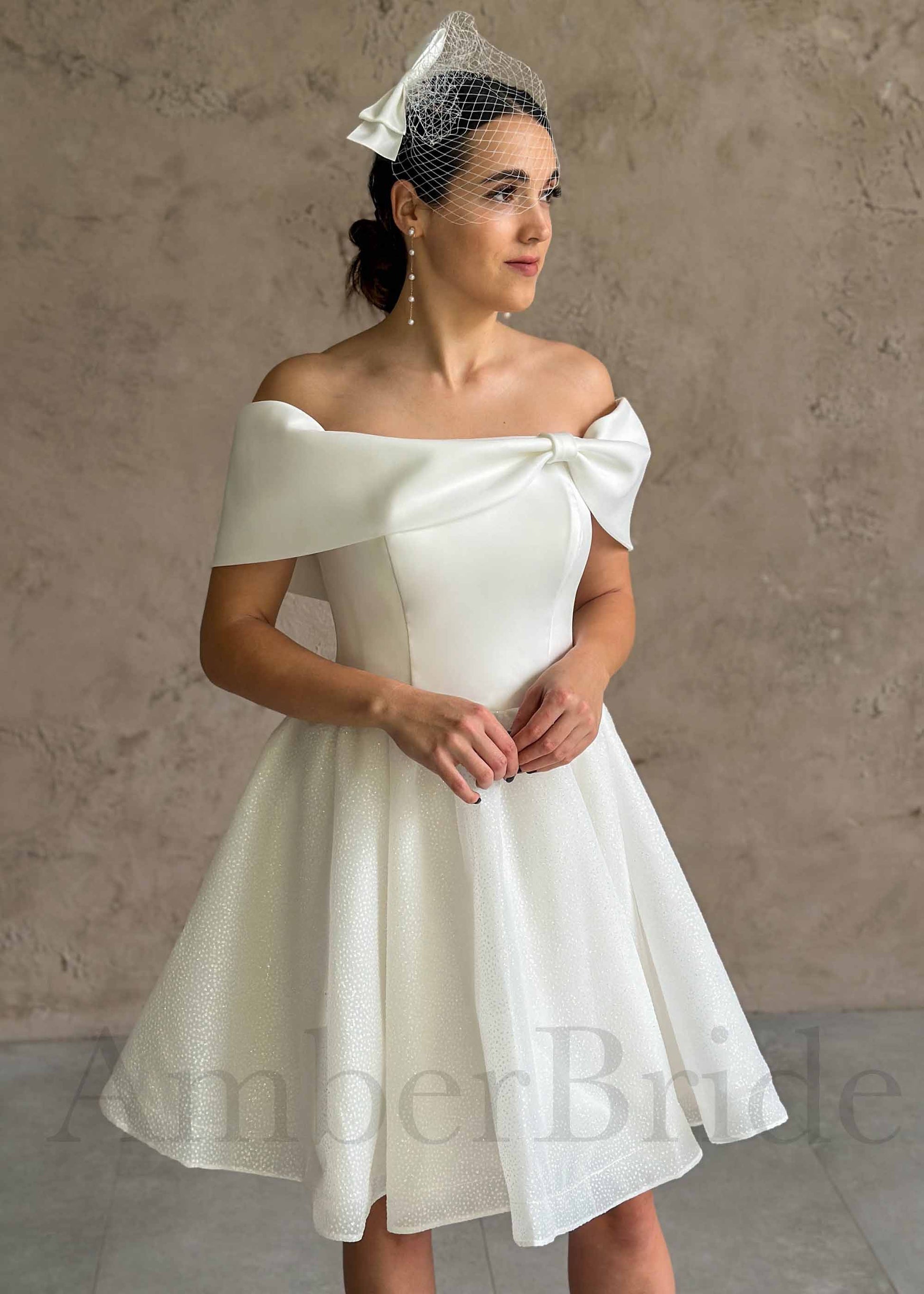 Elegant Knee-Length Dress with Satin Bow and Sparkling Organza Skirt