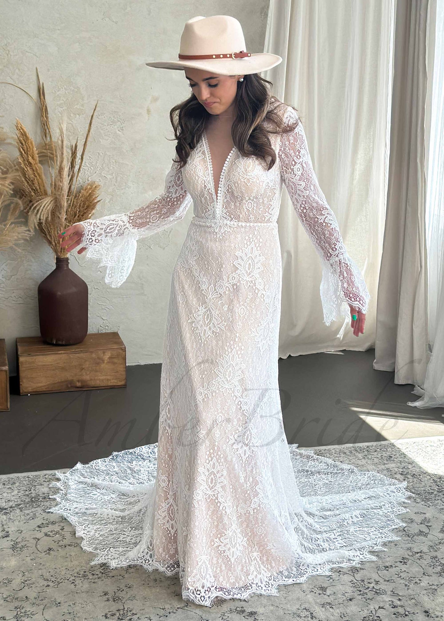 Boho Mermaid Lace Wedding Dress with Long Sleeve and Backless Design