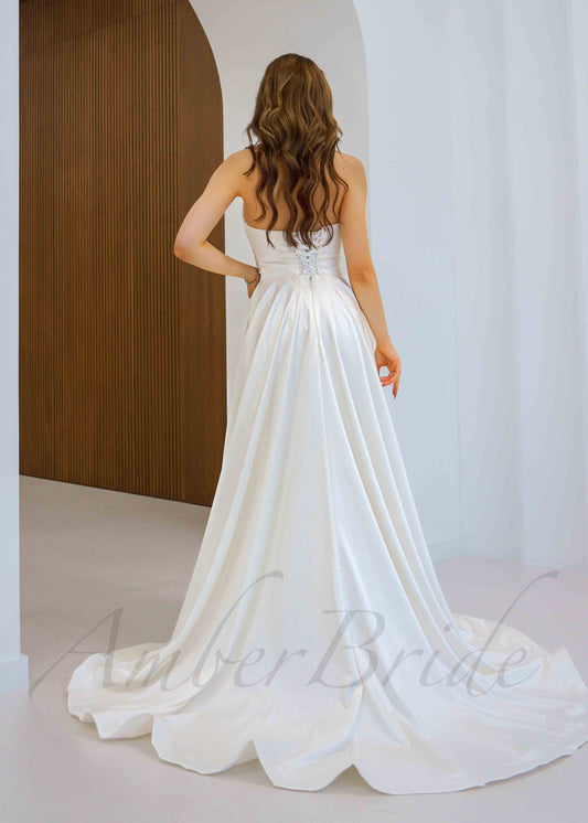 Classic A-Line Satin Wedding Dress with Strapless Design and Corset – back view | AmberBride
