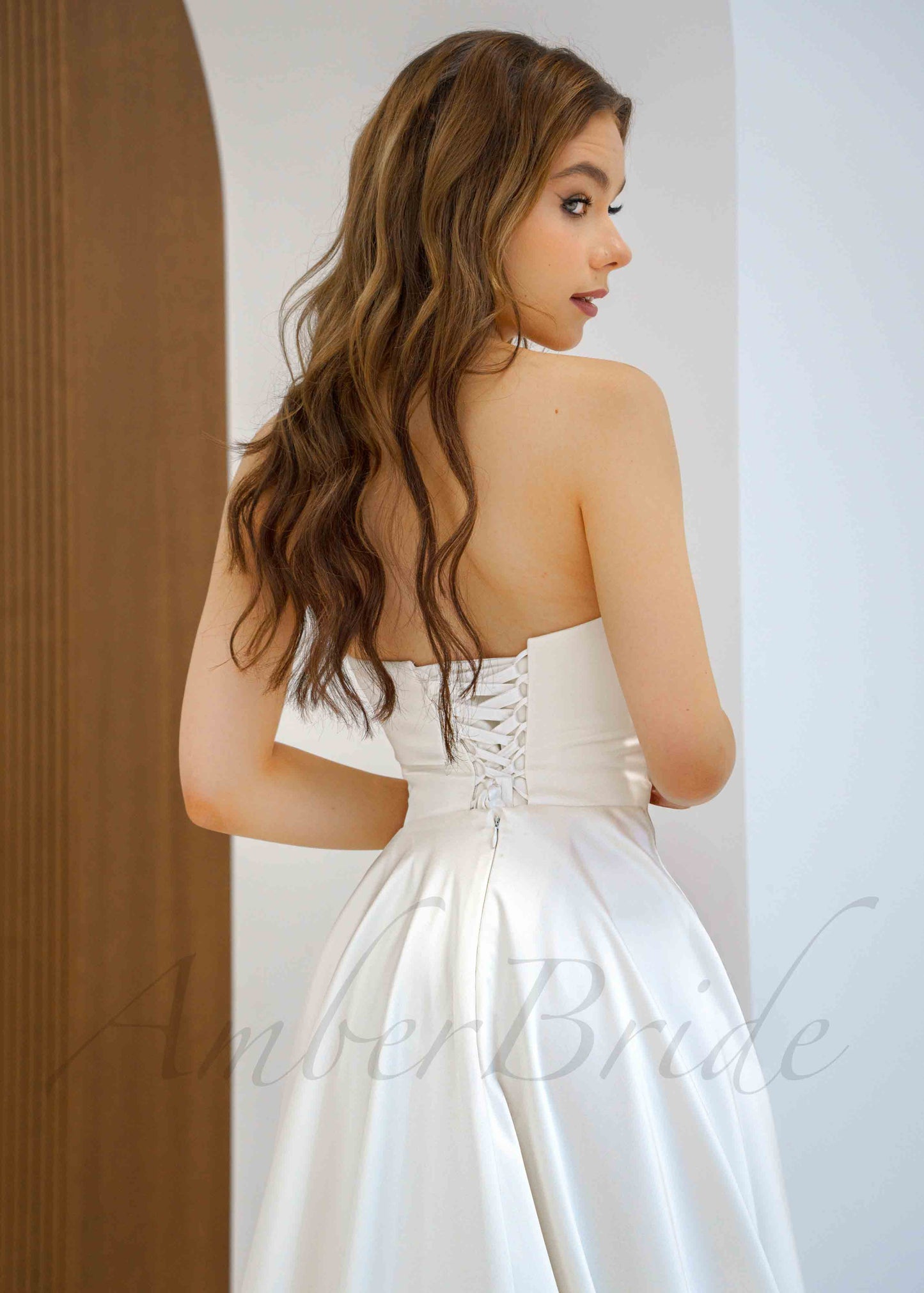 Classic A Line Satin Wedding Dress with Strapless Design and Corset