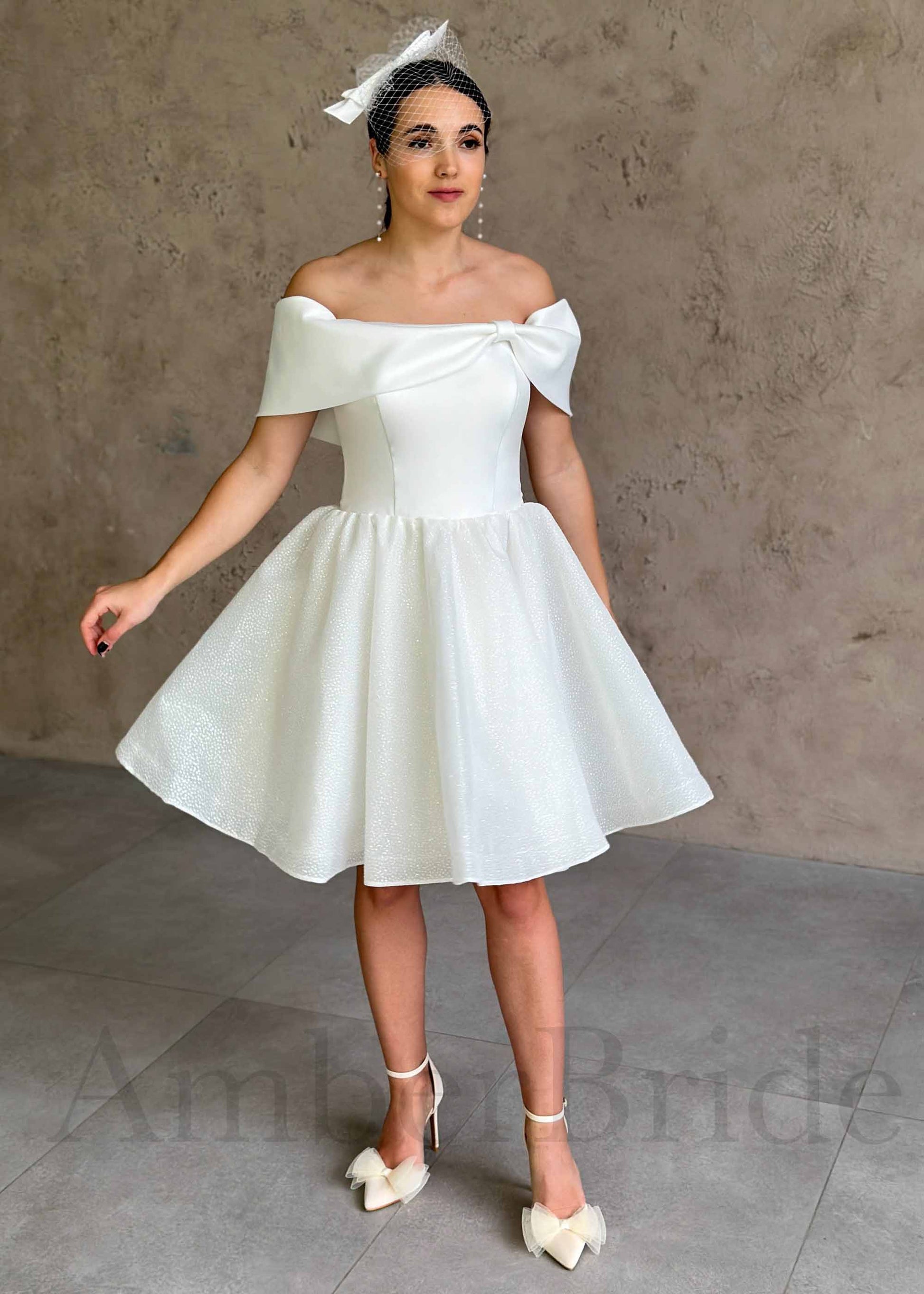 Elegant Knee-Length Dress with Satin Bow and Sparkling Organza Skirt