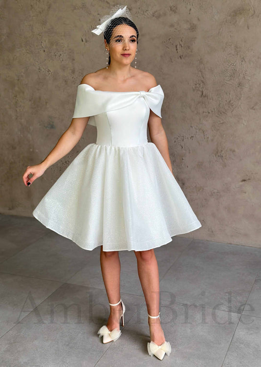 Elegant Knee-Length Dress with Satin Bow and Sparkling Organza Skirt