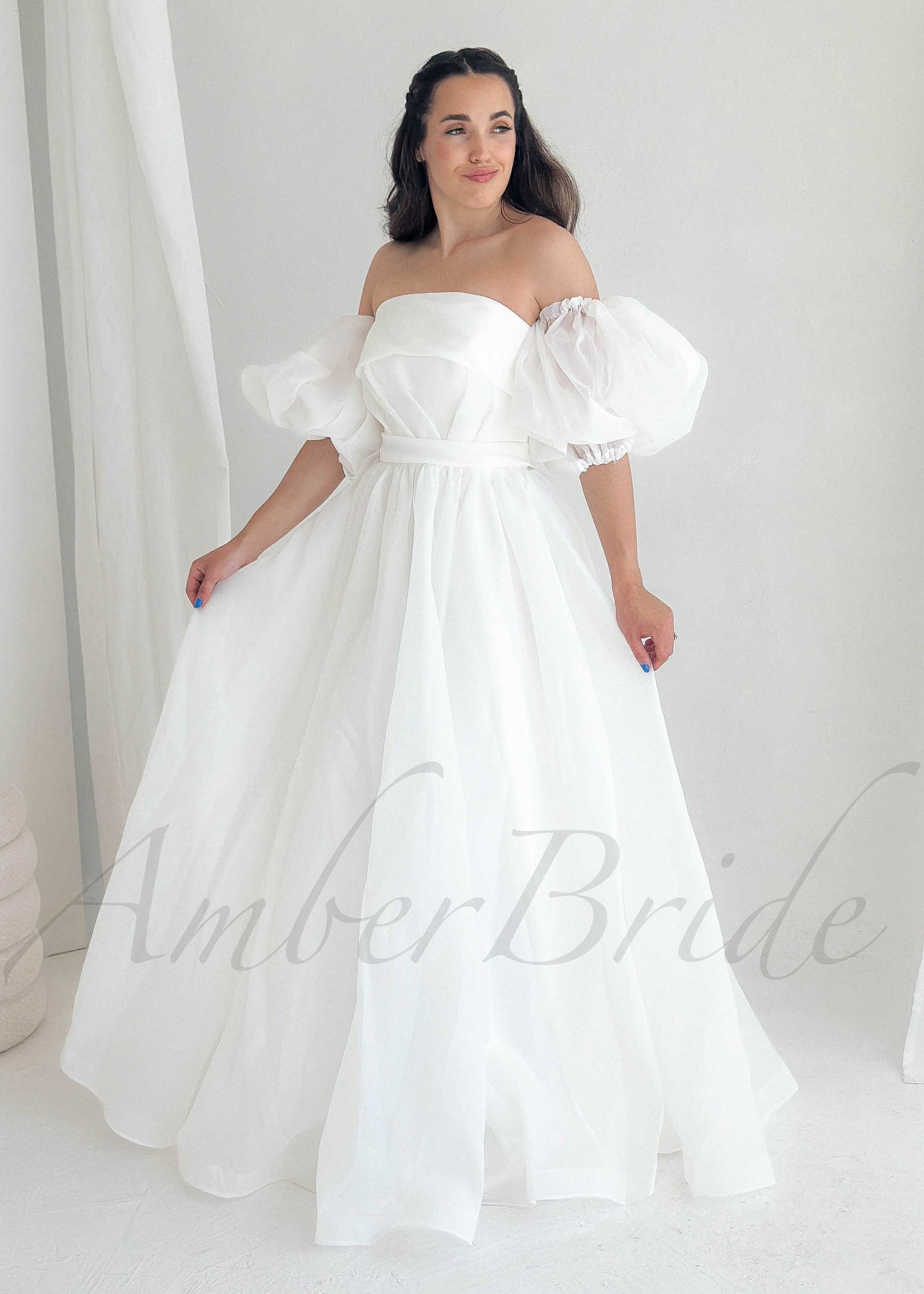 Elegant A Line Organza Wedding Dress with Strapless Design and Puffed Sleeves