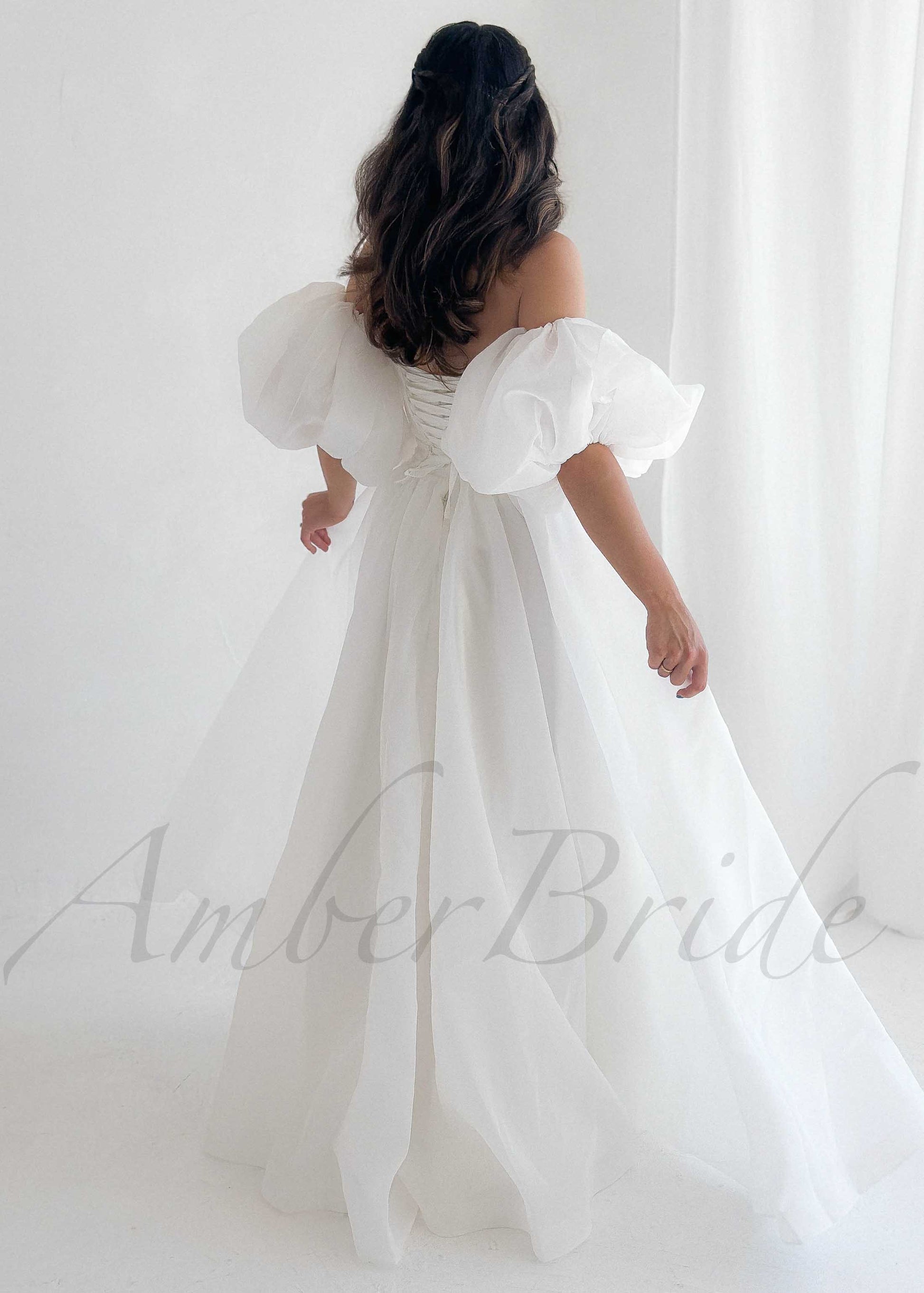 Elegant A Line Organza Wedding Dress with Strapless Design and Puffed Sleeves