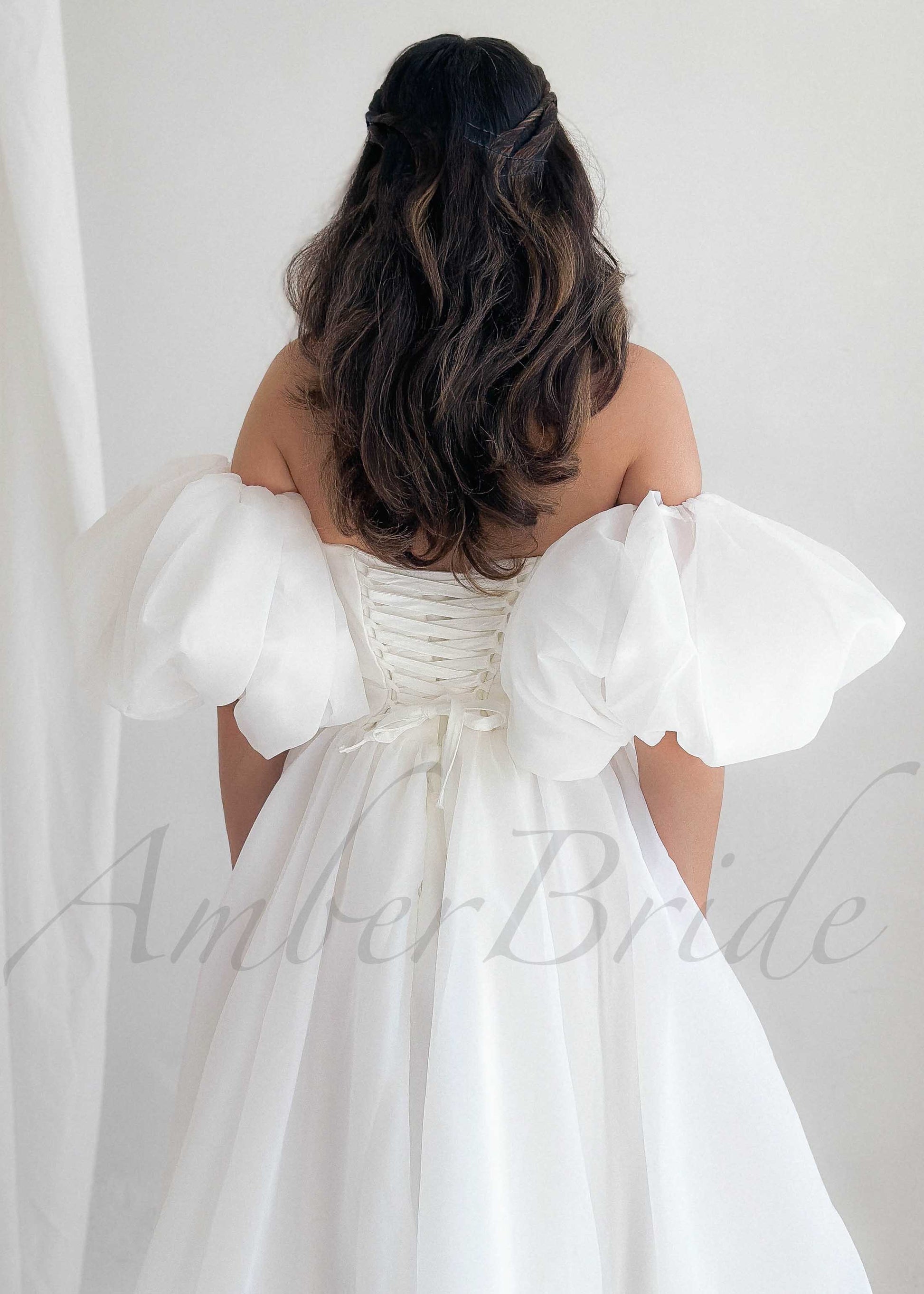 Elegant A Line Organza Wedding Dress with Strapless Design and Puffed Sleeves