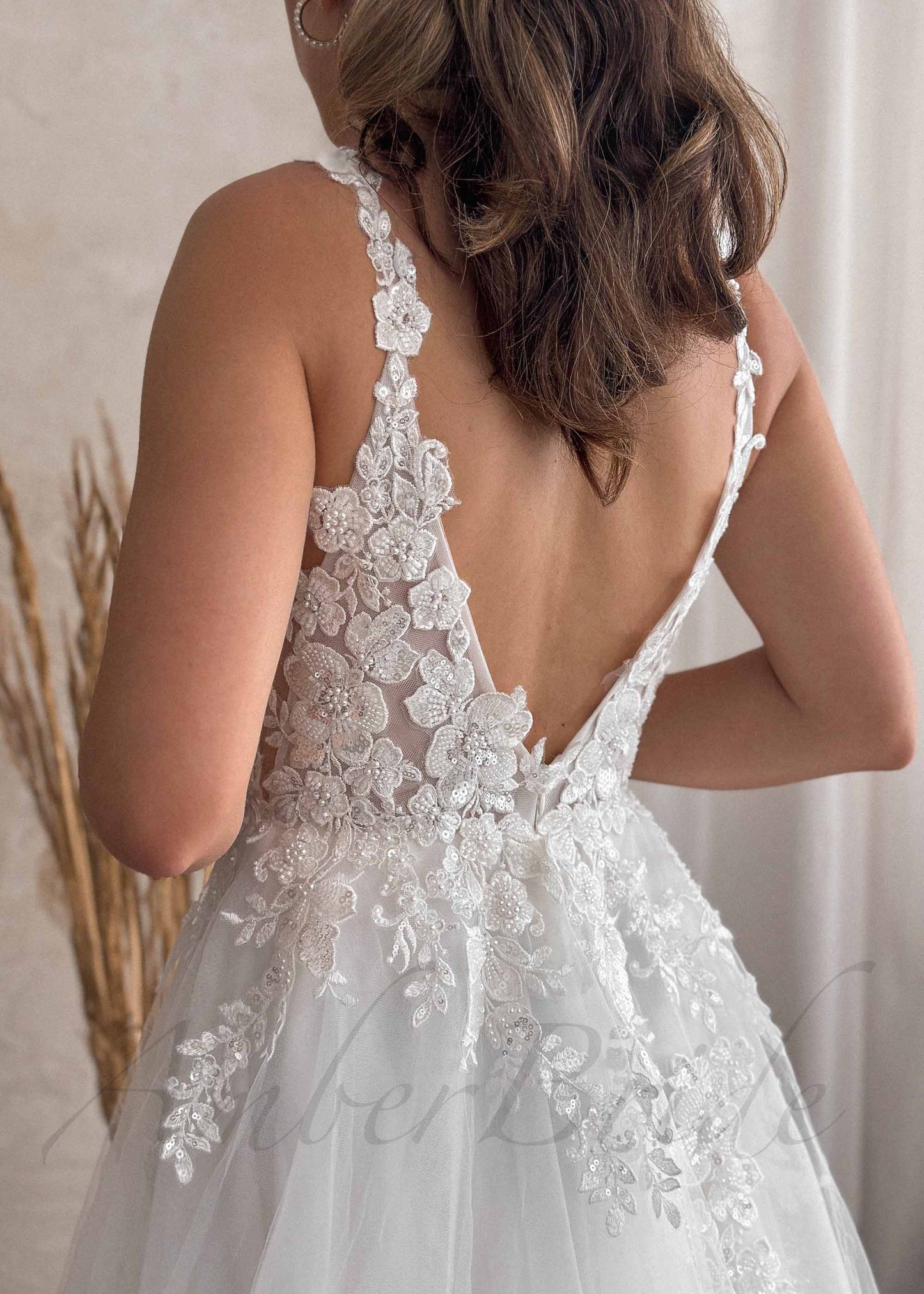 Romantic A Line Wedding Dress with Floral Design and Open Back