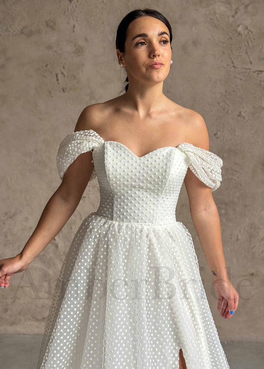 Elegant A Line Tulle Wedding Dress with Polka Dot and Off Shoulder Design