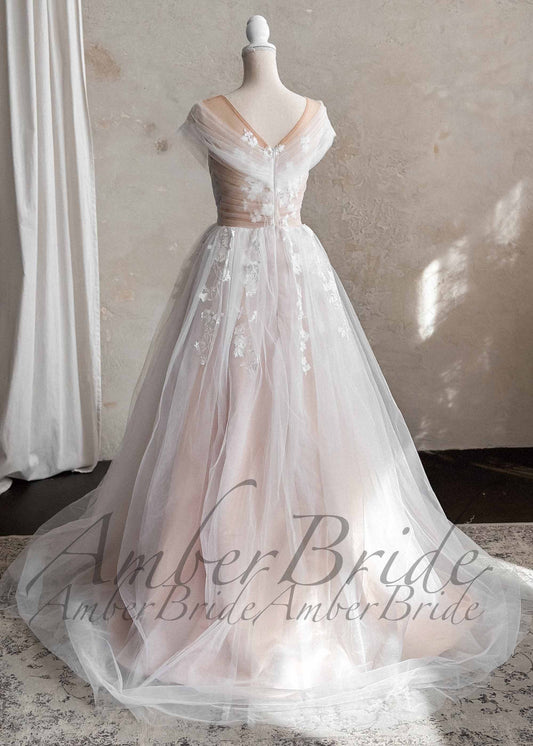 Romantic Off-Shoulder Tulle Wedding Dress with Floral Appliqué and Illusion Neckline – front view, on dress form | AmberBride