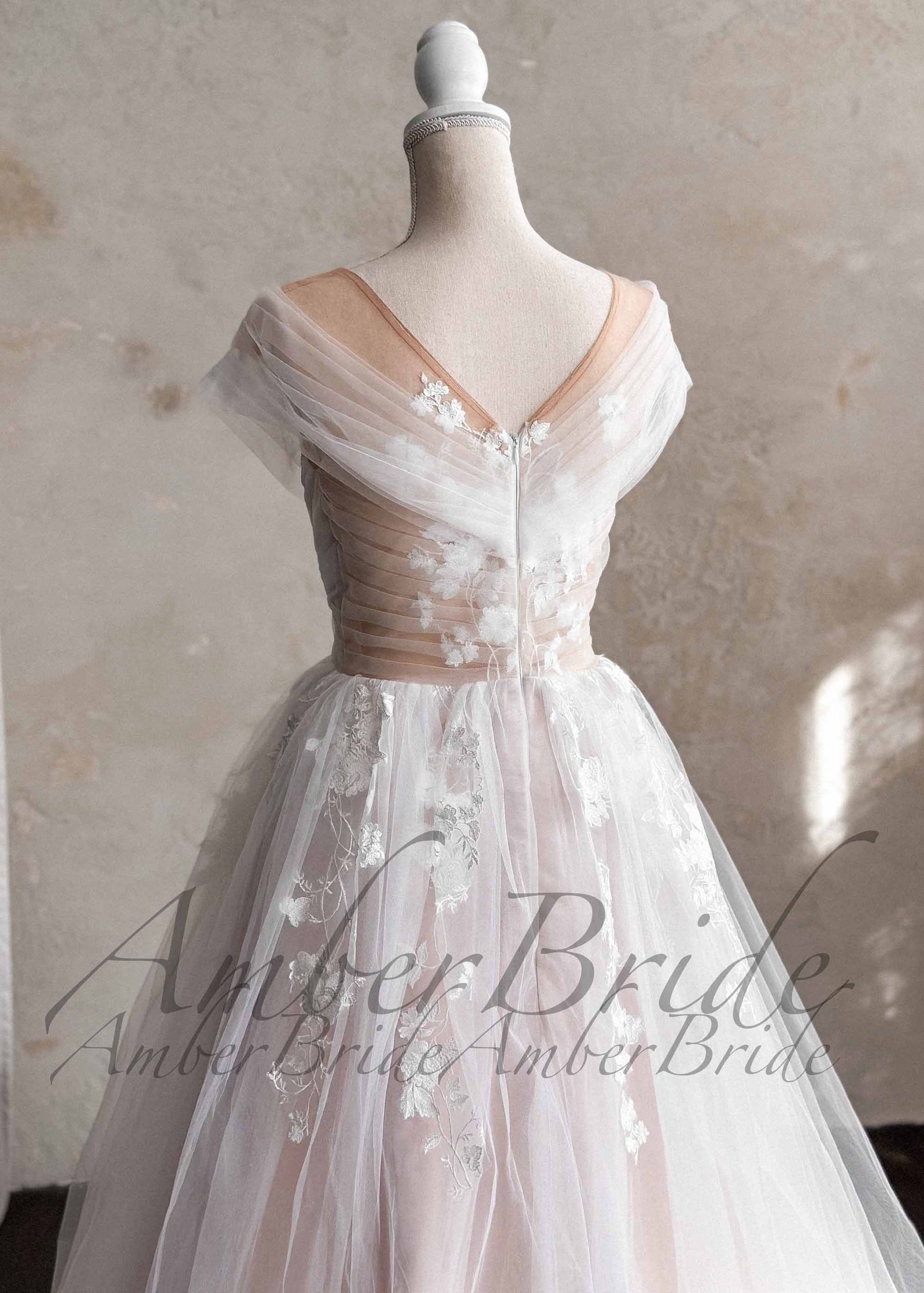 Romantic Off-Shoulder Tulle Wedding Dress with Floral Appliqué and Illusion Neckline