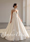 A-line satin wedding gown with a corset-style sweetheart bodice and draped neck scarf.