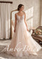 A-line wedding dress with a deep V-neck, floral lace bodice, spaghetti straps, and a full, flowing tulle skirt.