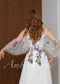 Fairy Off-White Chiffon A-Line Wedding Dress with Colorful Floral Embroidery and Off-Shoulder Straps