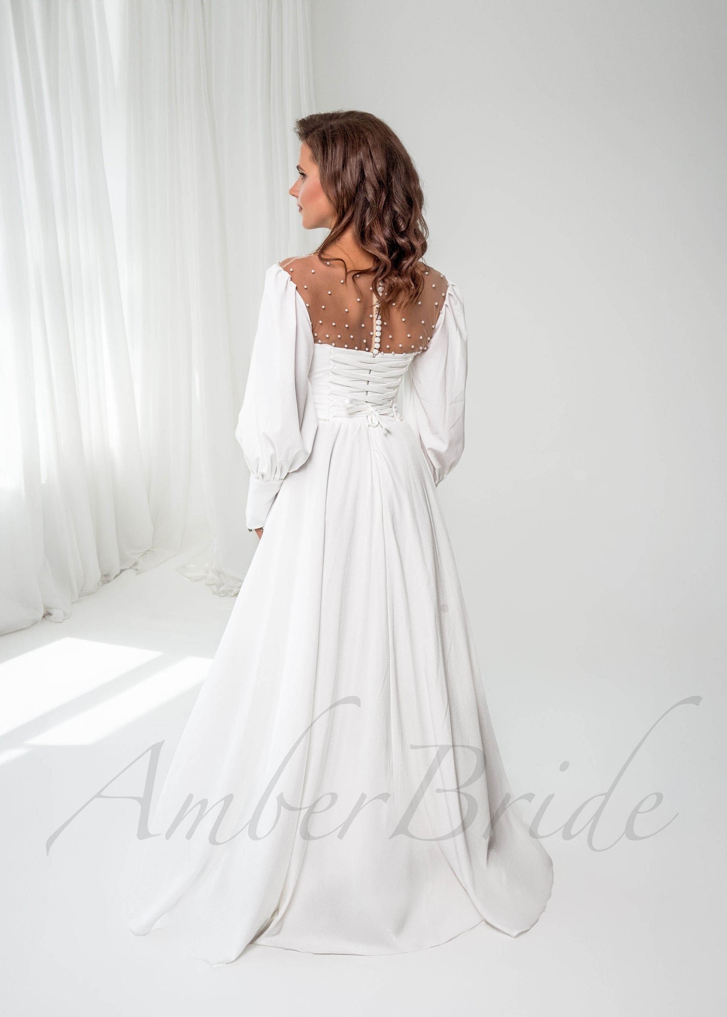 Exquisite A Line Satin Wedding Dress with Bishop Sleeves and Illusion Pearls Design