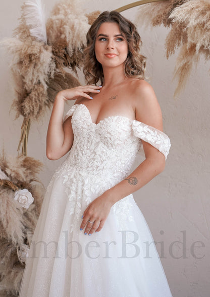 Exclusive Off Shoulder Glittery Wedding Dress with Floral Design and Corset