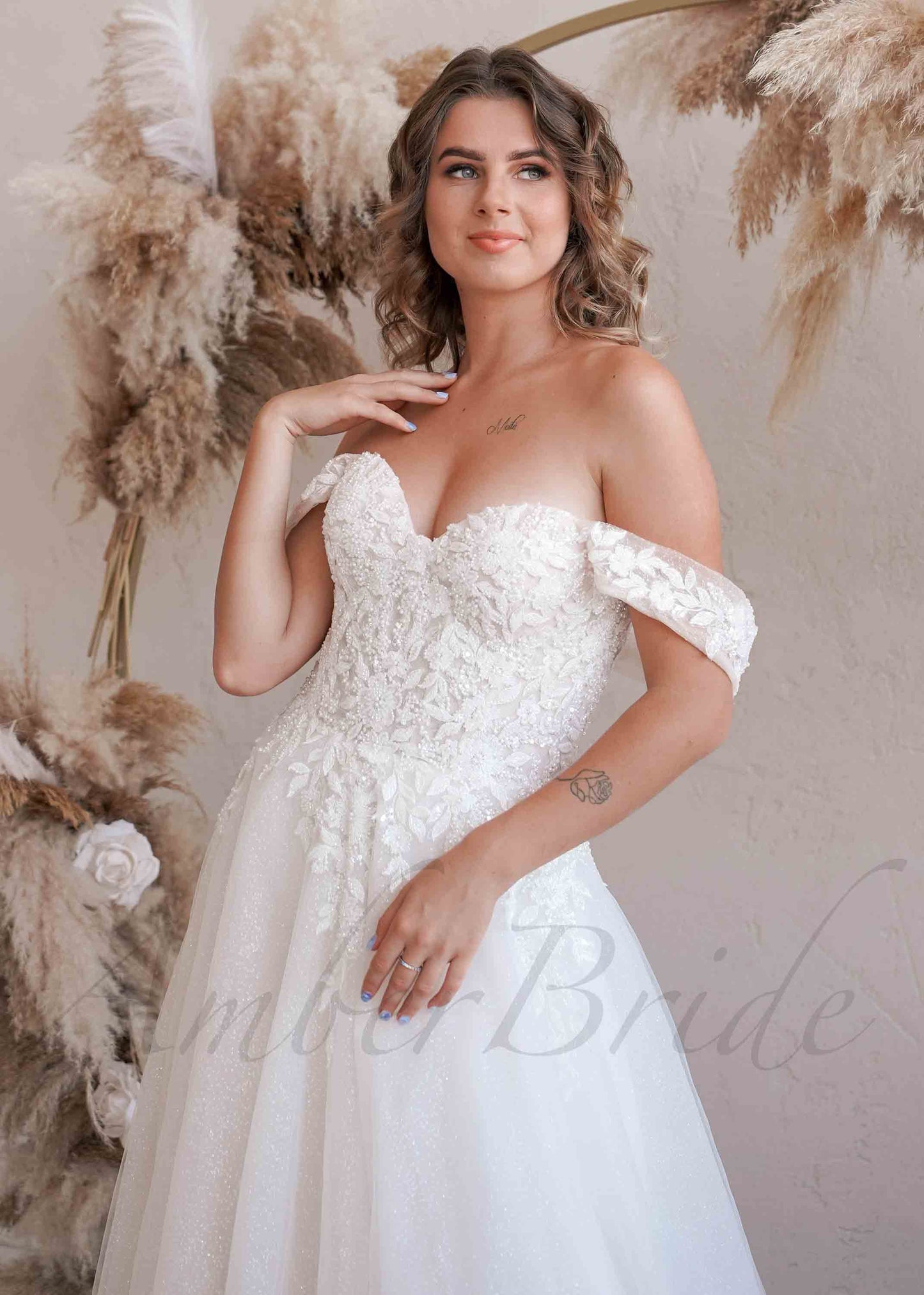 Exclusive Off Shoulder Glittery Wedding Dress with Floral Design and Corset