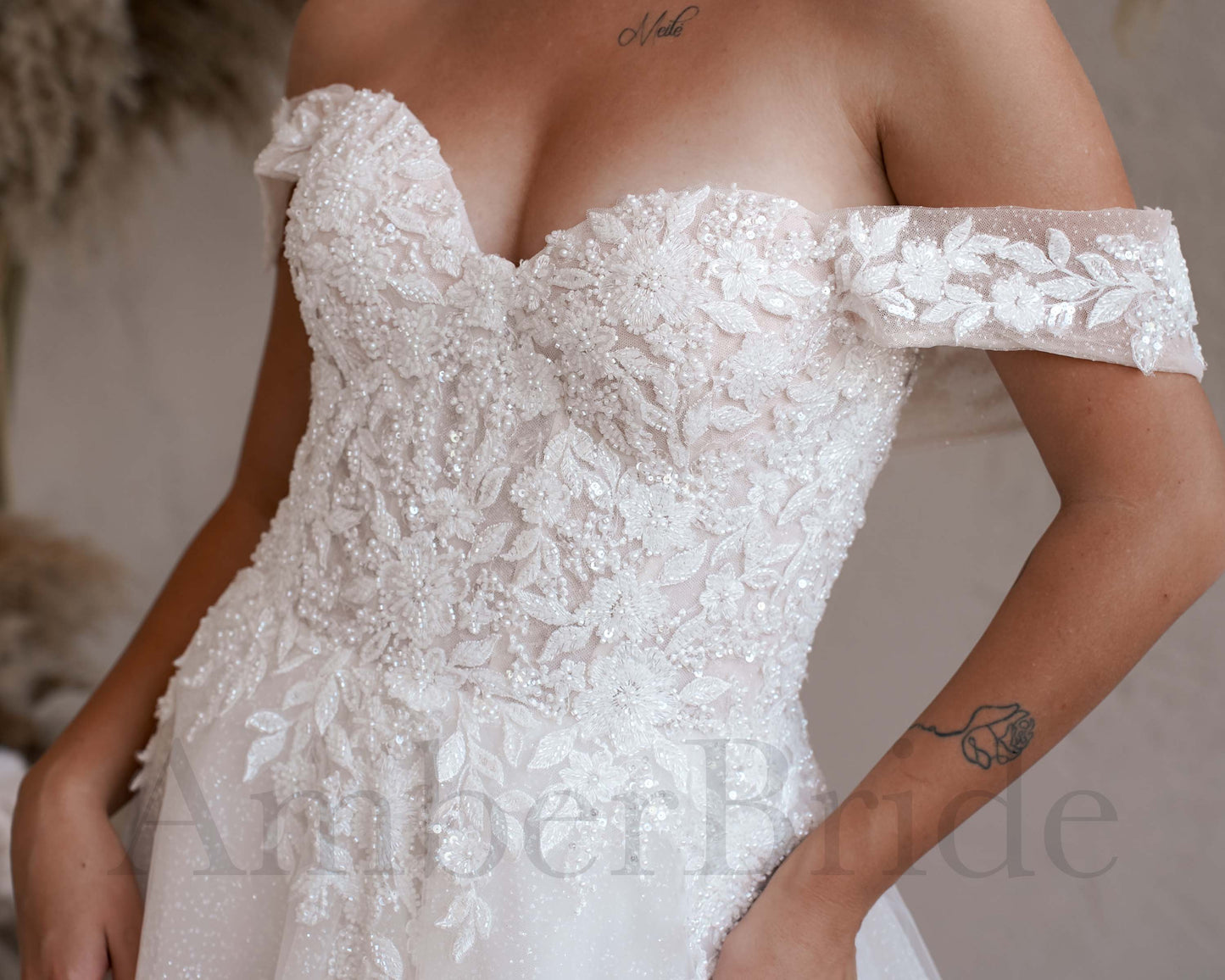 Exclusive Off Shoulder Glittery Wedding Dress with Floral Design and Corset