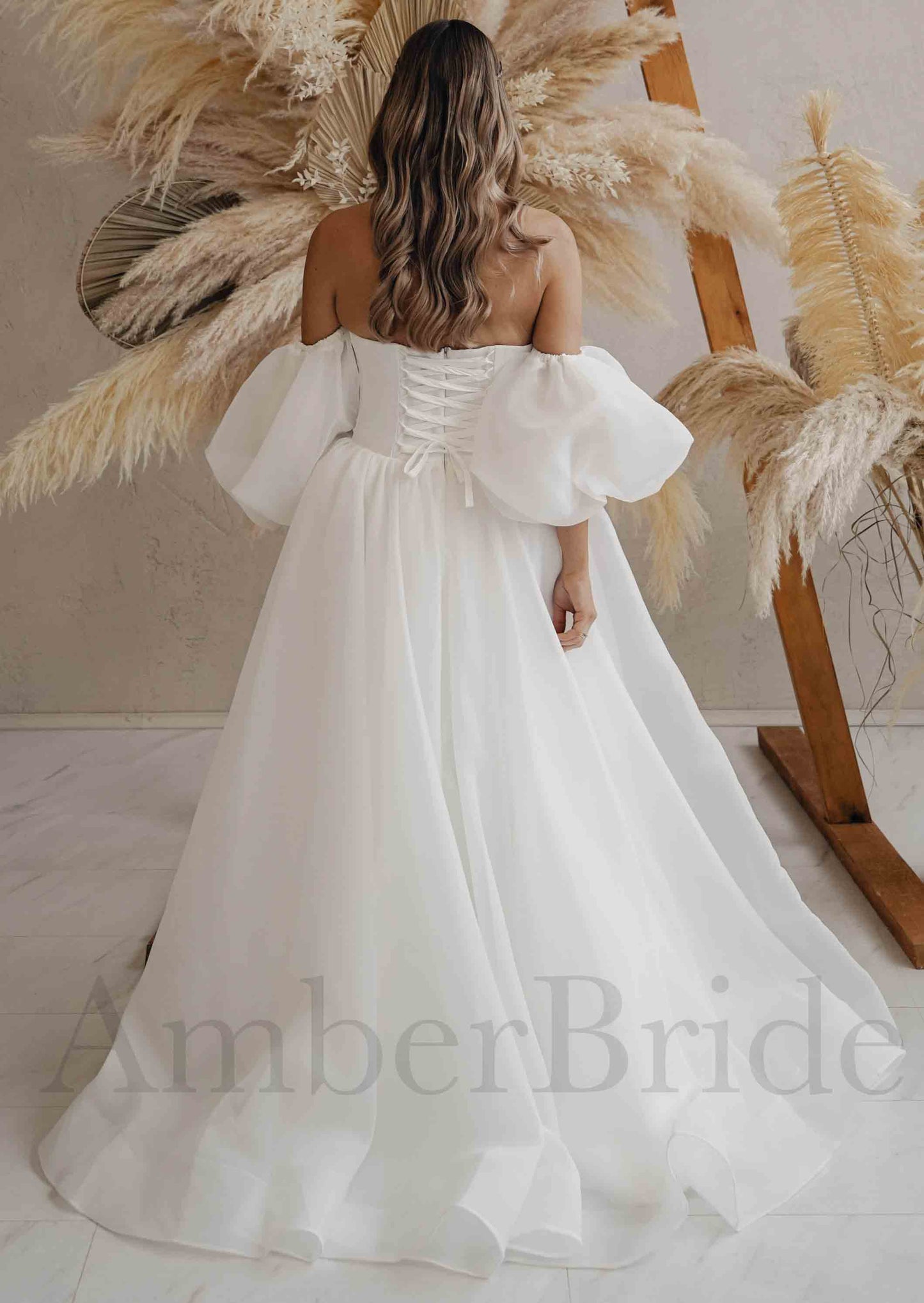 Elegant A Line Organza Wedding Dress with Off Shoulder Sweetheart Design and Puffed Sleeves