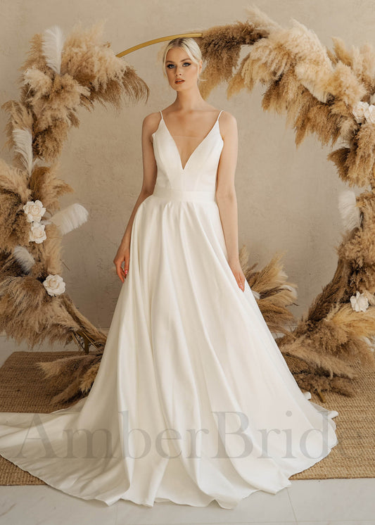 Minimalist A Line Satin Wedding Dress with Spaghetti Straps and Backless Design