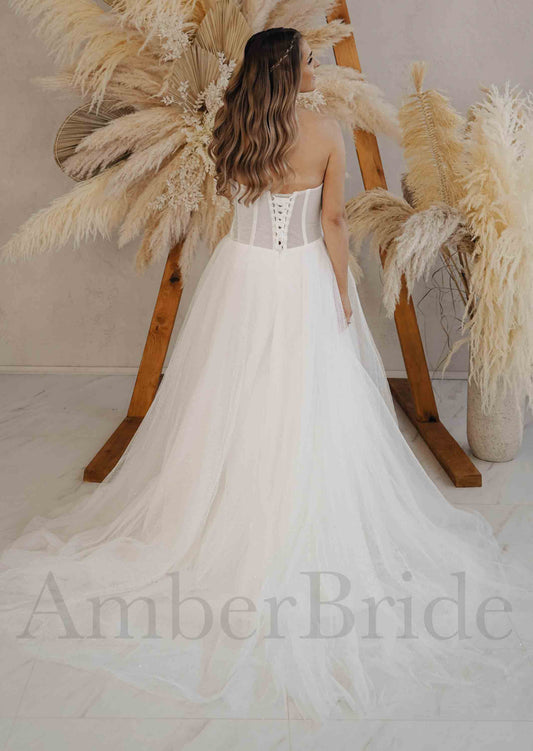 Modern A-Line Strapless Wedding Dress with Deep V Neckline and Tulle Skirt