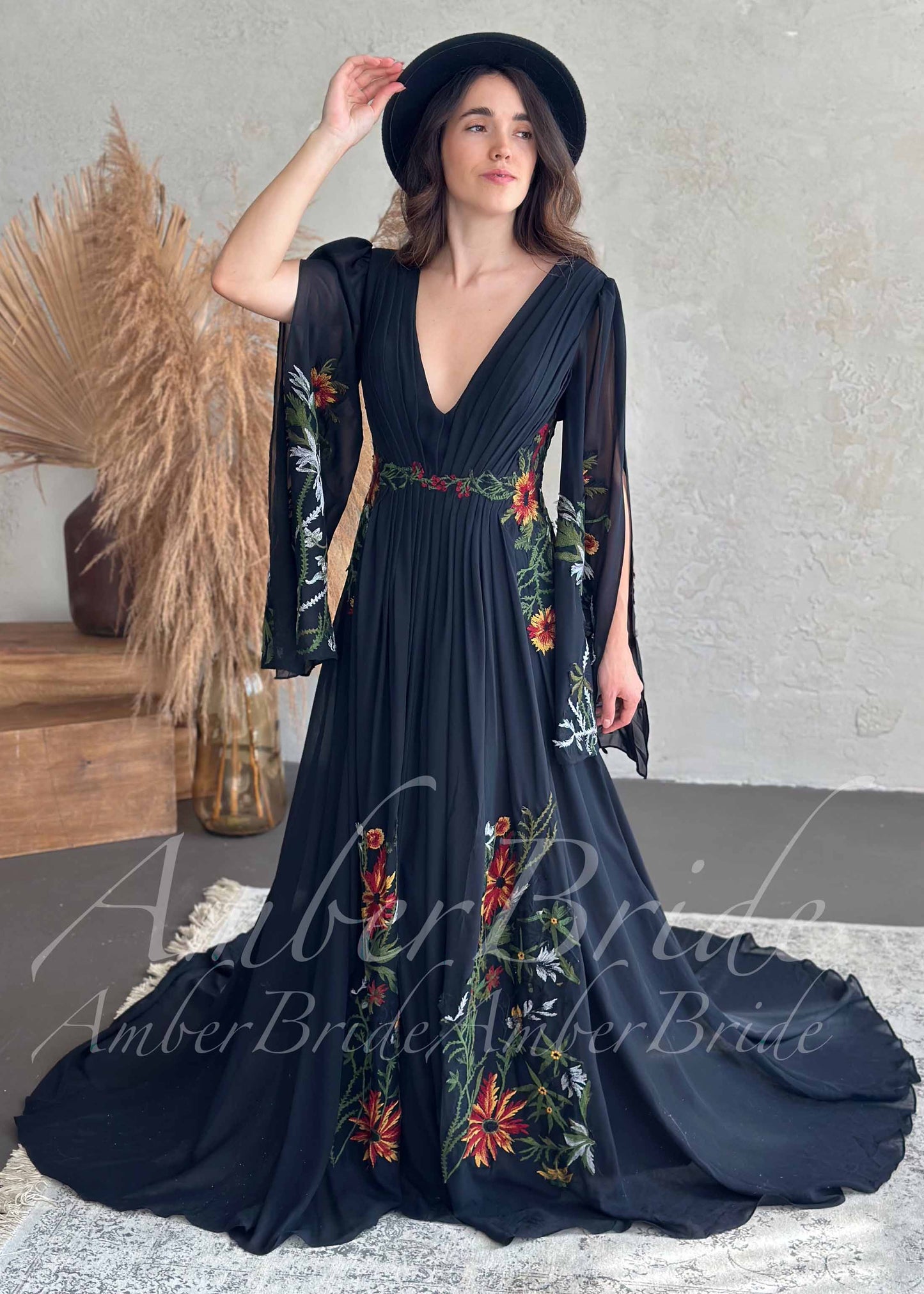 Bohemian Black A-Line Wedding Dress with Floral Embroidery and Flowing Bell Sleeves