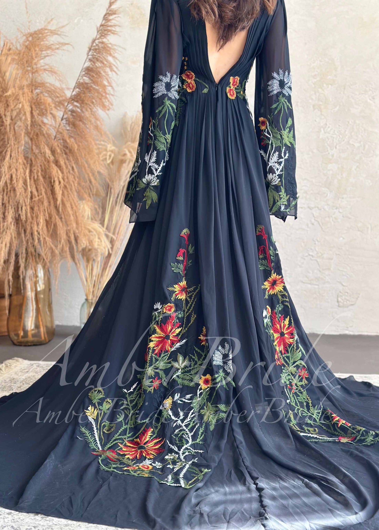 Bohemian Black A-Line Wedding Dress with Floral Embroidery and Flowing Bell Sleeves