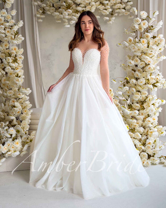 Luxury A-Line Tulle Wedding Dress with Heavy Pearl Beaded Bodice and Long Illusion Sleeves – front view | AmberBride