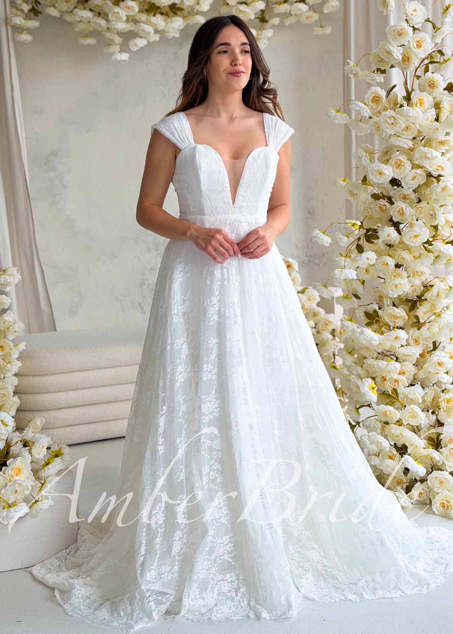 Romantic A-Line Lace Wedding Dress with Off-Shoulder Sleeves and Deep V-Neckline