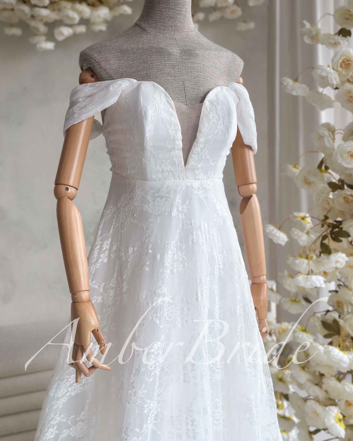 STOCK SELL-OUT: Romantic A-Line Lace Wedding Dress with Off-Shoulder Sleeves and Deep V-Neckline