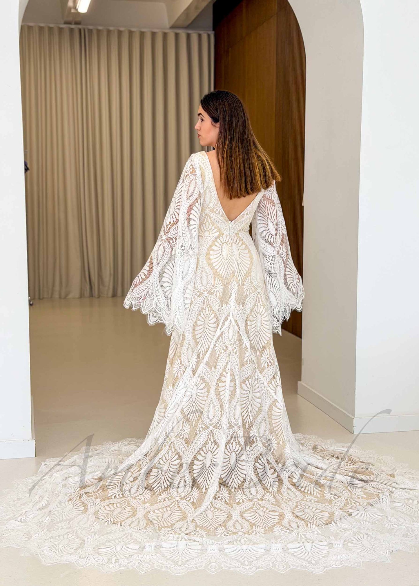 Boho A-Line Patterned Lace Wedding Dress with Flared Bell Sleeves and Nude Lining