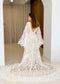 Boho A-Line Patterned Lace Wedding Dress with Flared Bell Sleeves and Nude Lining