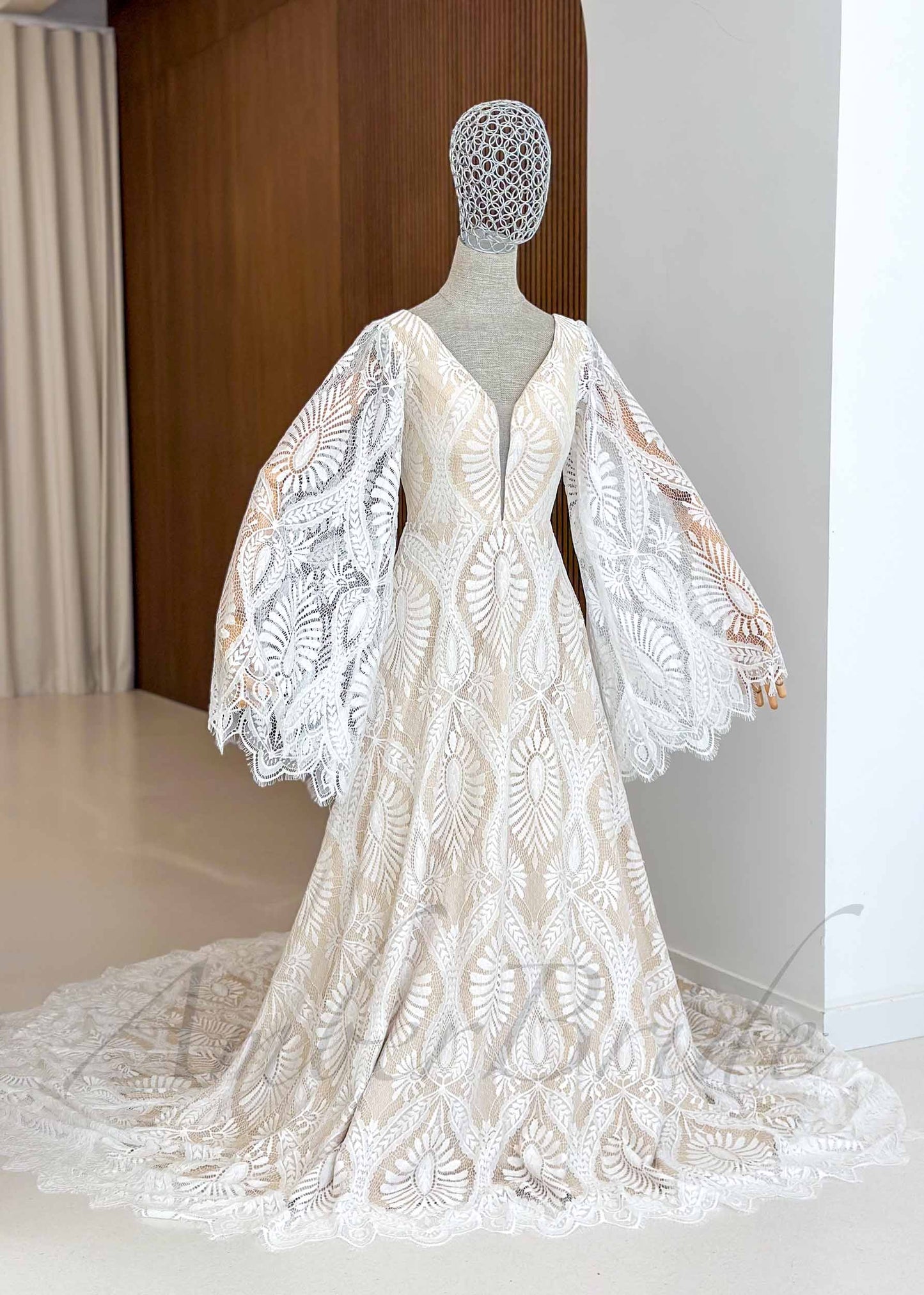 Boho A-Line Patterned Lace Wedding Dress with Flared Bell Sleeves and Nude Lining