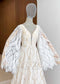 Boho A-Line Patterned Lace Wedding Dress with Flared Bell Sleeves and Nude Lining