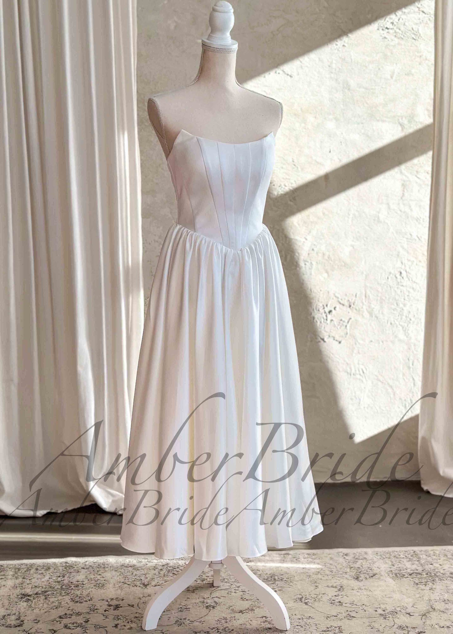 Tea-Length Wedding Reception Dress with Basque Waistline and Satin Bodice