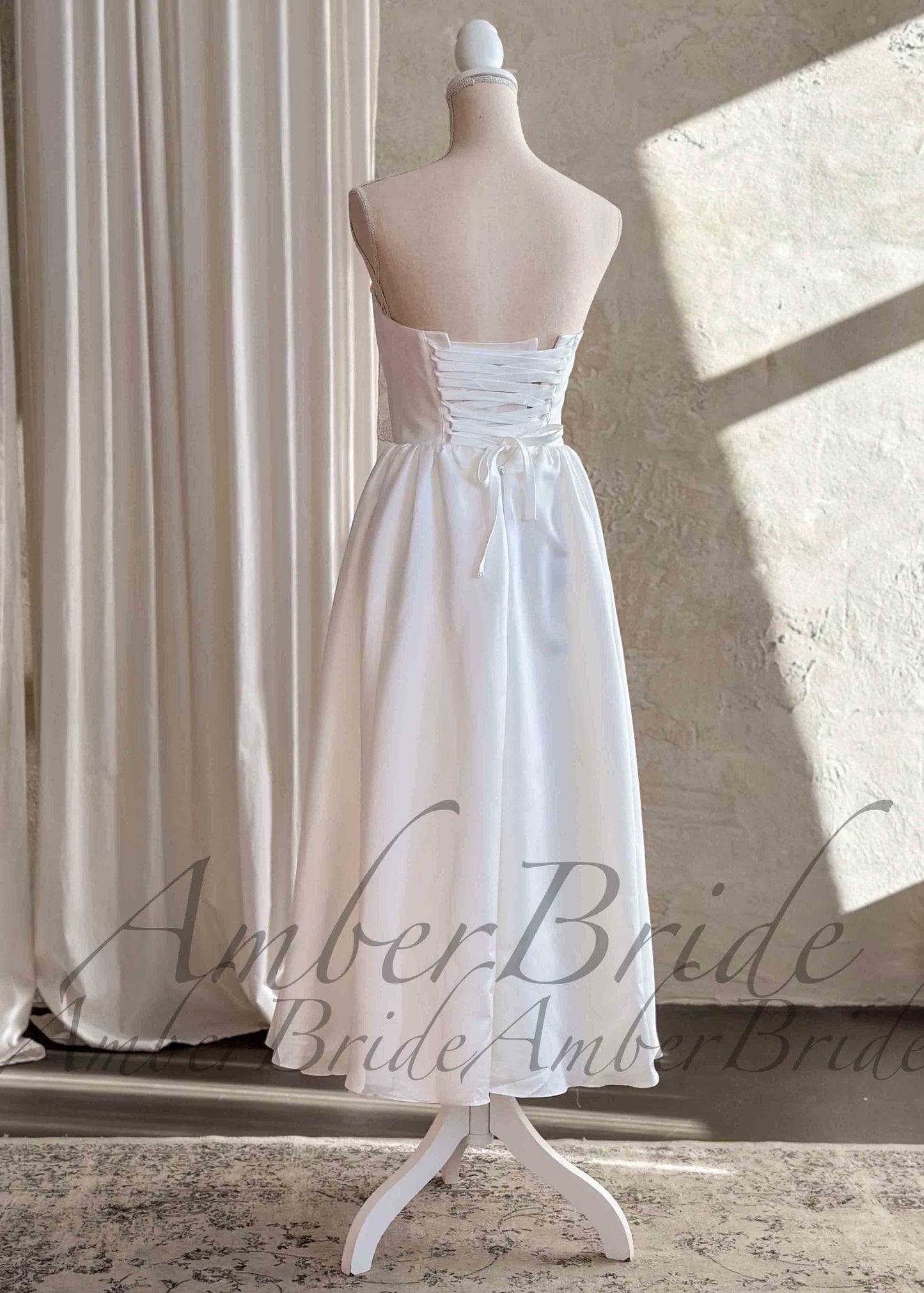 Tea-Length Wedding Reception Dress with Basque Waistline and Satin Bodice