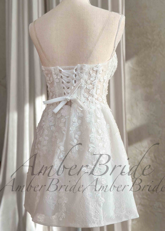 Short Floral Strapless Wedding Reception Dress with Sheath Silhouette – front view, on dress form | AmberBride