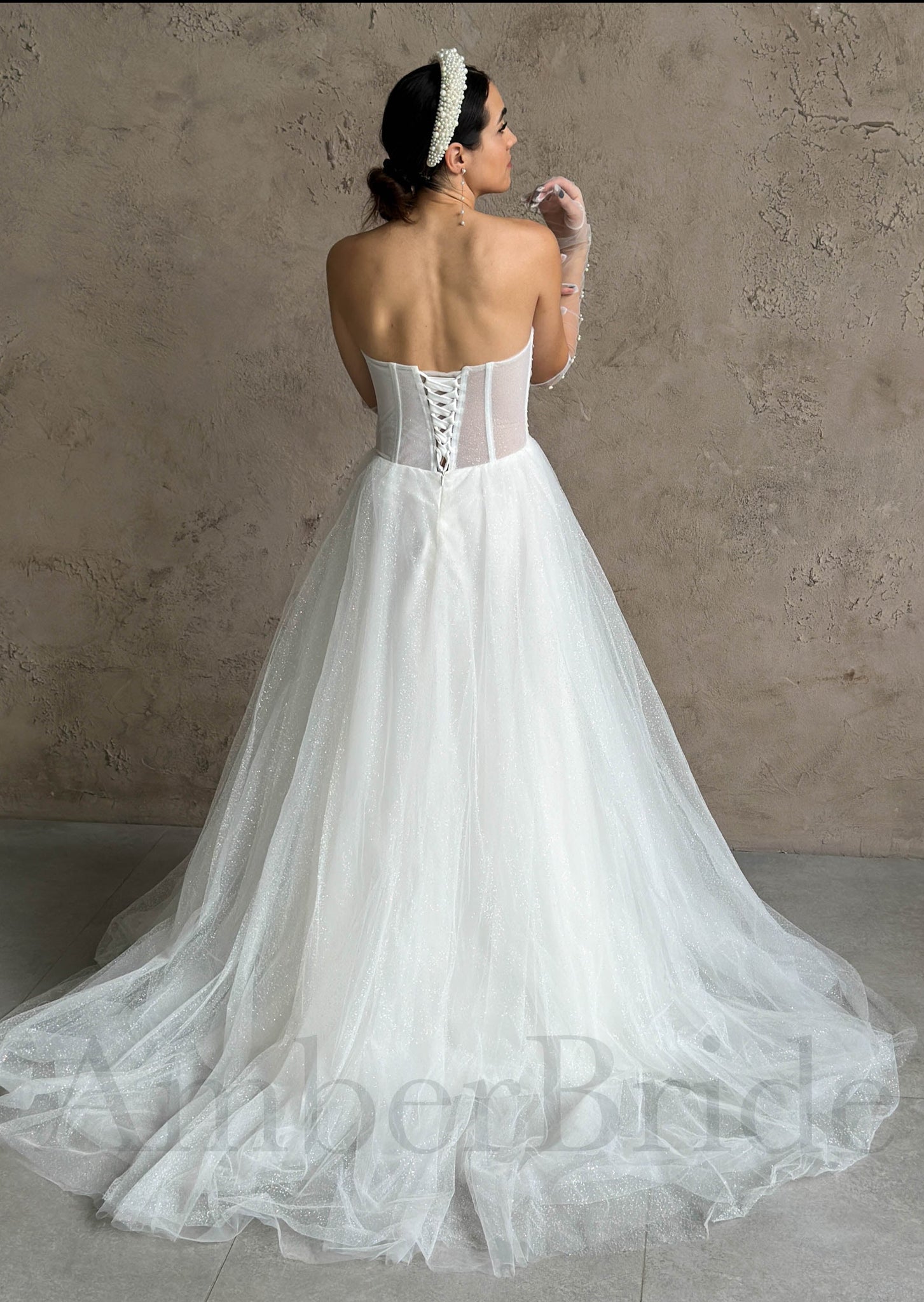 Modern A-Line Strapless Wedding Dress with Deep V Neckline and Tulle Skirt