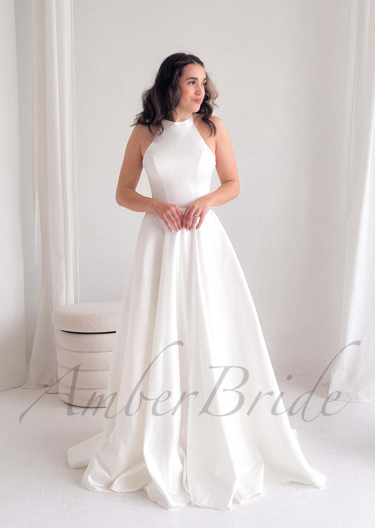 Minimalistic A Line Satin Wedding Dress with Halter Neckline and Open Back