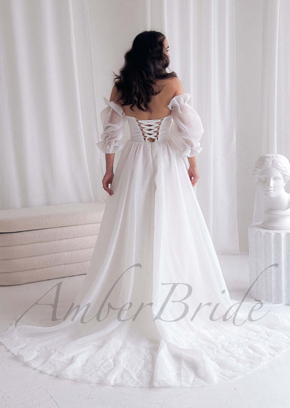 Exquisite Organza Wedding Dress with Strapless Folded Bodice Design