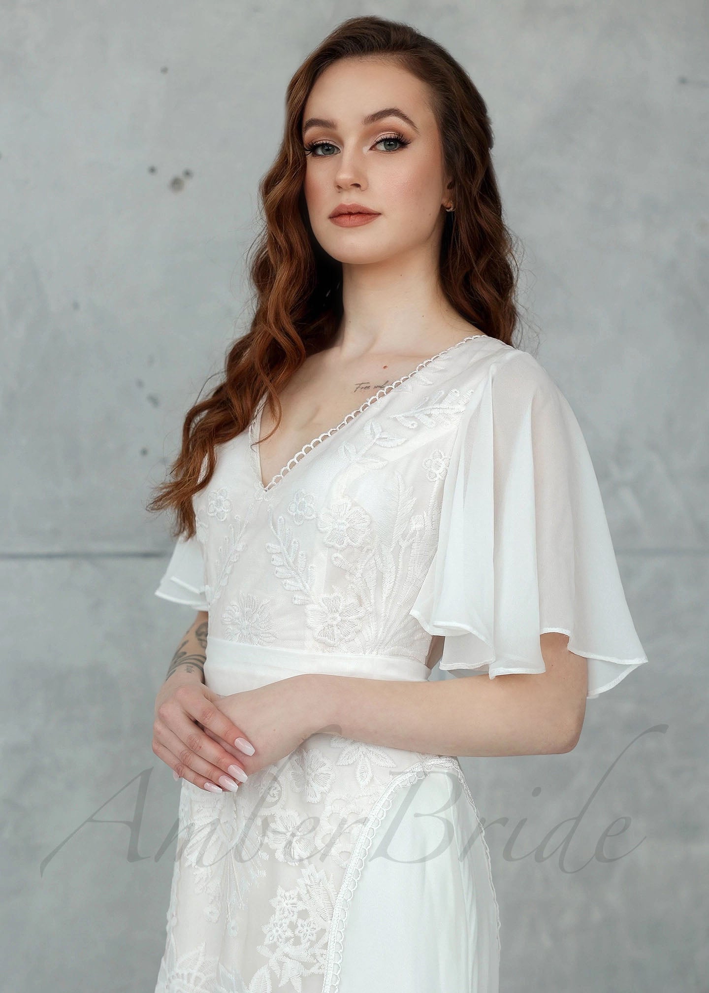 Boho A-Line Chiffon Wedding Dress with Lace Flowers, Cape Sleeve and Backless Design