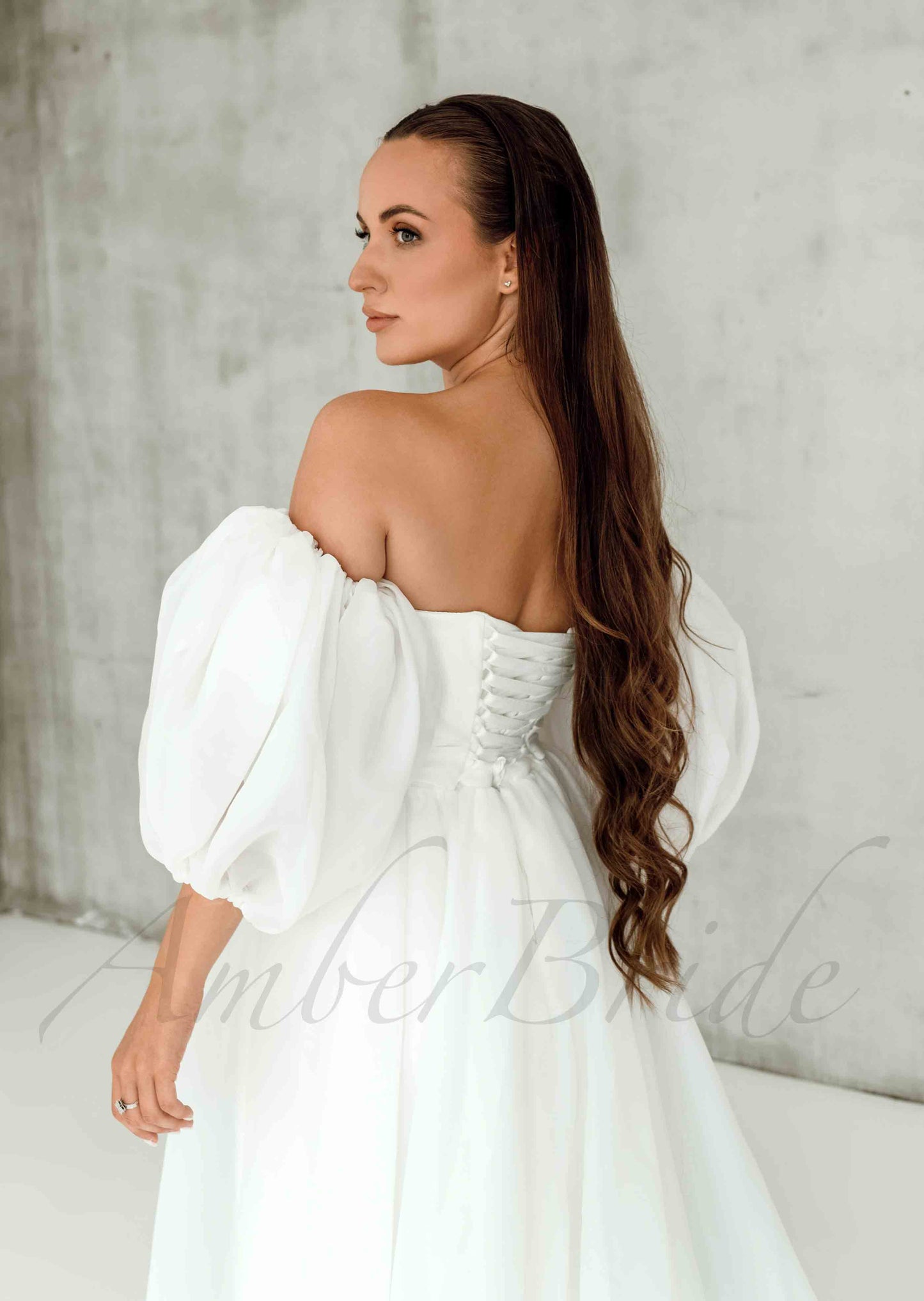 Elegant A Line Organza Wedding Dress with Strapless Design and Puffed Sleeves