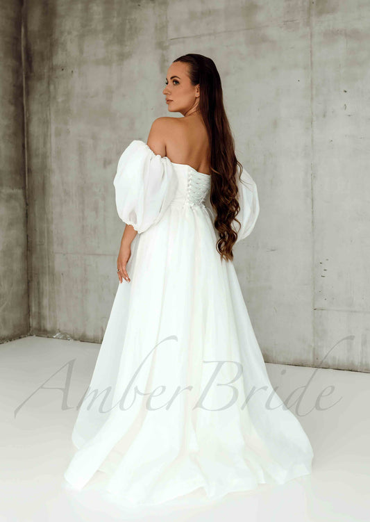 Elegant A Line Organza Wedding Dress with Strapless Design and Puffed Sleeves