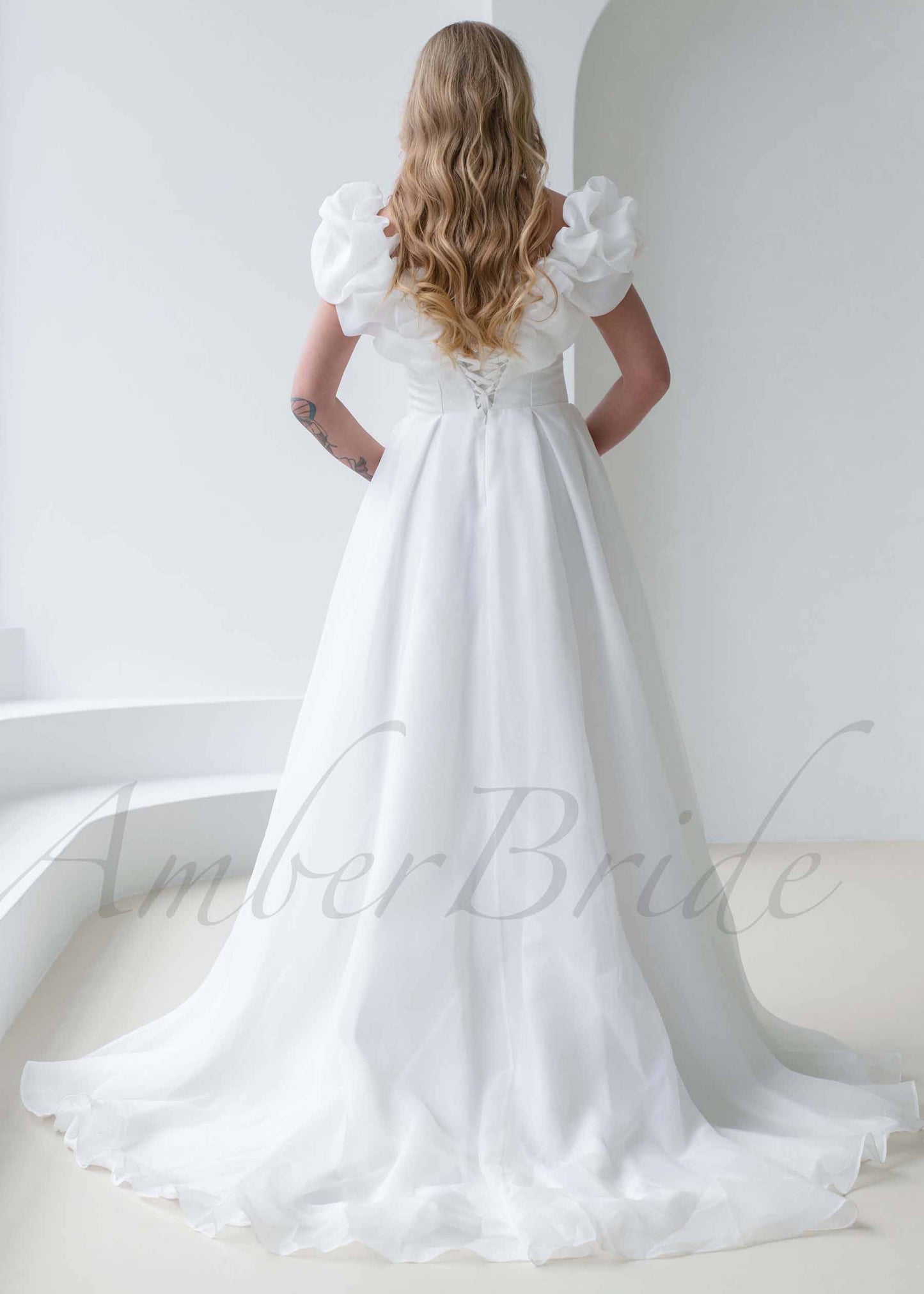 Exquisite A Line Organza Wedding Dress with Strapless Design and Corset