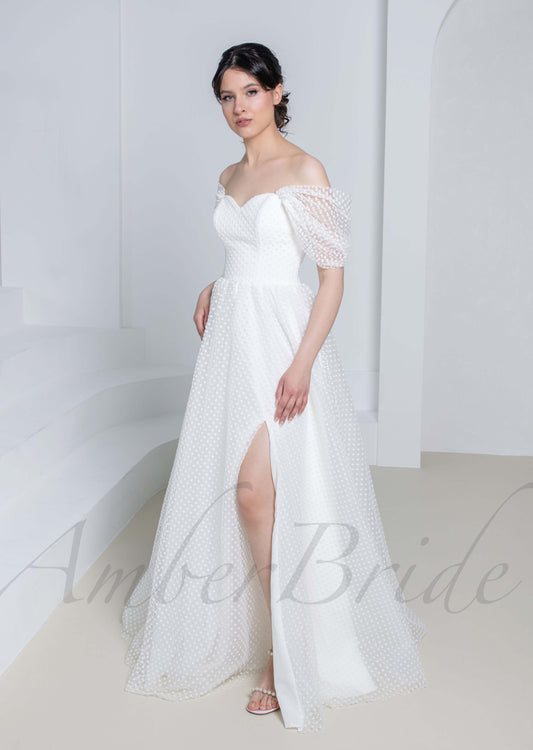 Elegant A Line Tulle Wedding Dress with Polka Dot and Off Shoulder Design