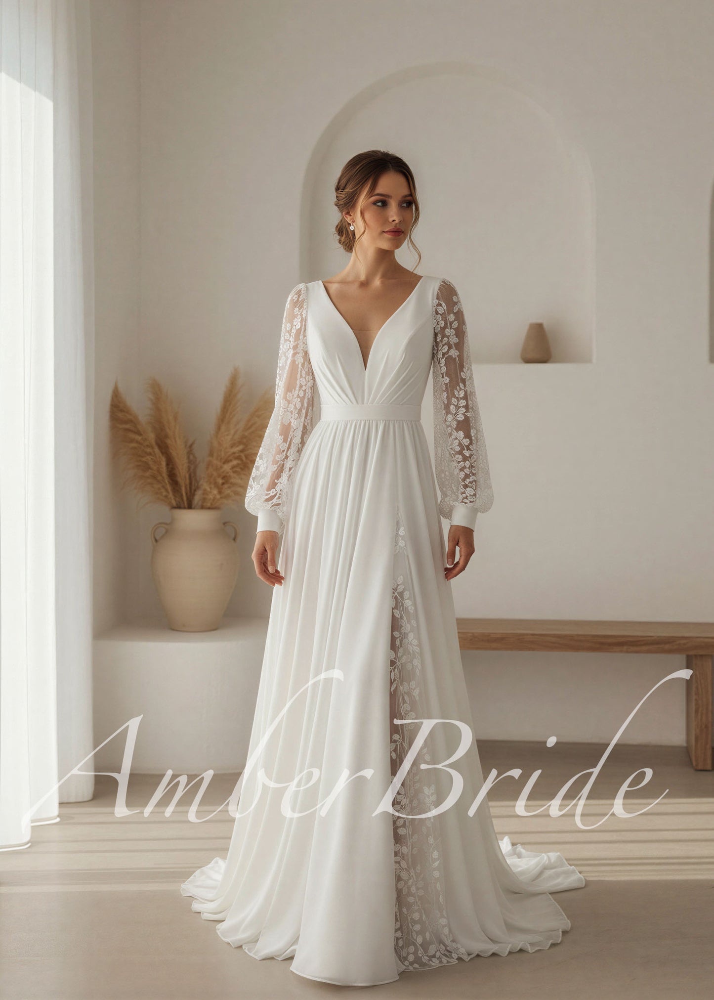 White A-line chiffon wedding dress with V-neck, lace bishop sleeves, and a high leg slit with lace detailing.
