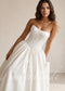 Satin ball gown wedding dress with a corset back and basque waist
