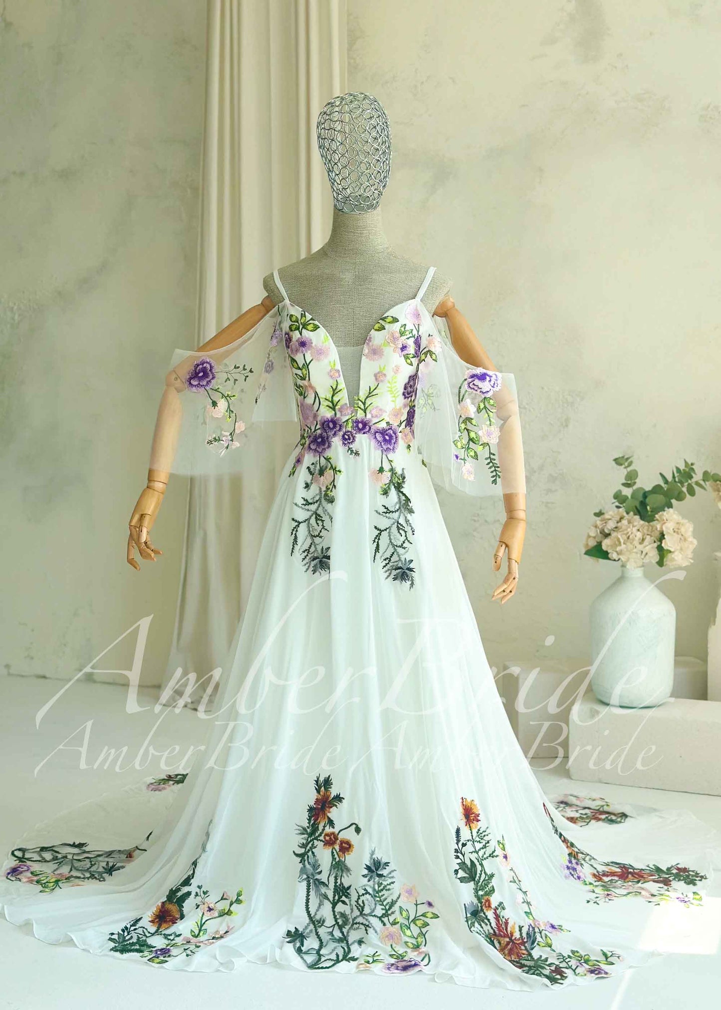 Fairy Off-White Chiffon A-Line Wedding Dress with Colorful Floral Embroidery and Off-Shoulder Straps