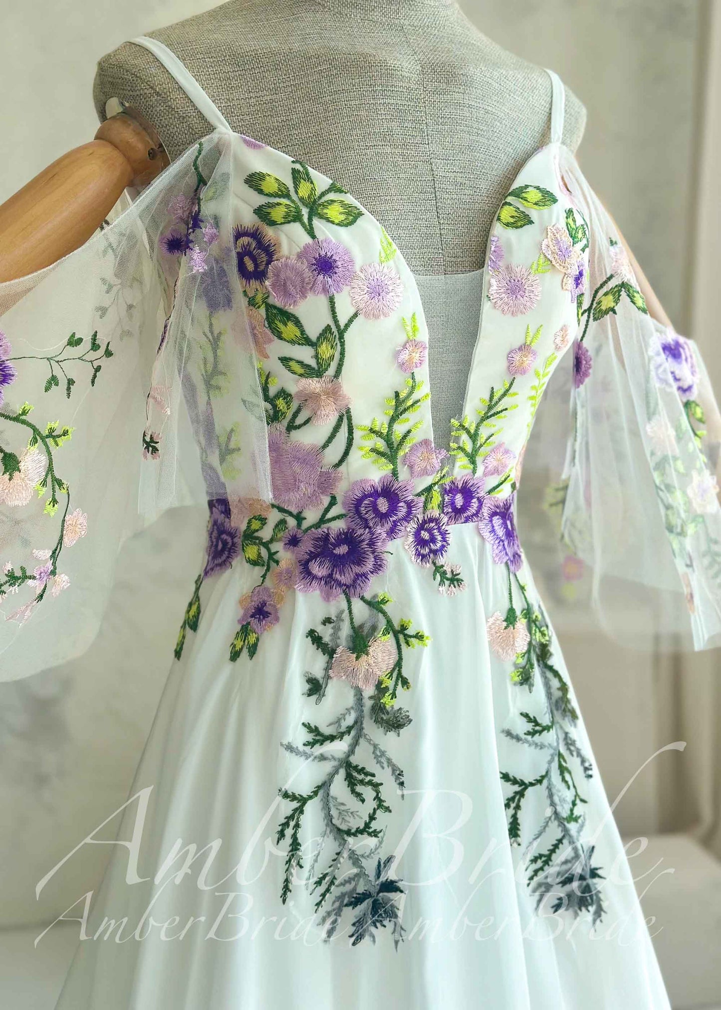 Fairy Off-White Chiffon A-Line Wedding Dress with Colorful Floral Embroidery and Off-Shoulder Straps