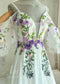 Fairy Off-White Chiffon A-Line Wedding Dress with Colorful Floral Embroidery and Off-Shoulder Straps