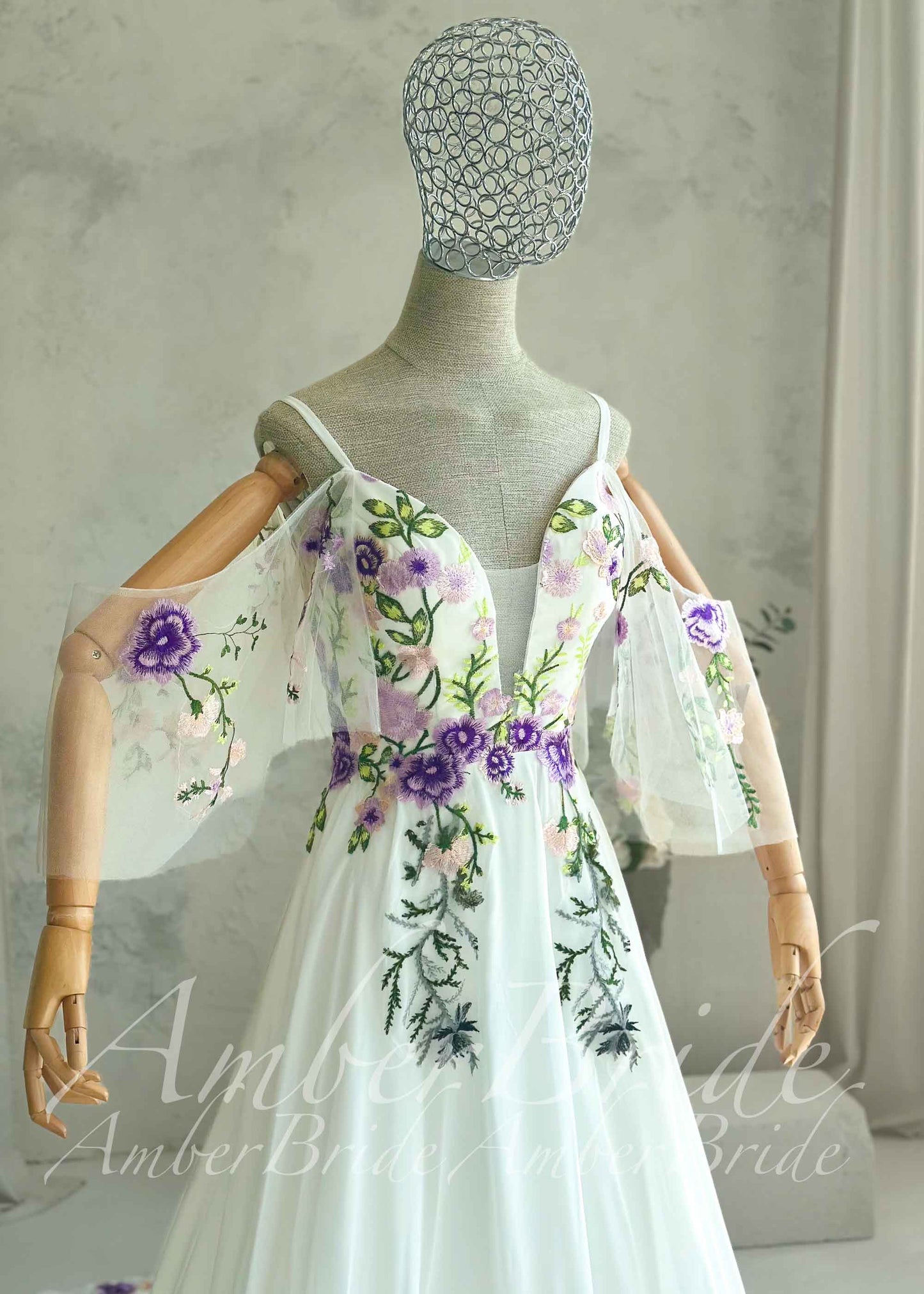 Fairy Off-White Chiffon A-Line Wedding Dress with Colorful Floral Embroidery and Off-Shoulder Straps