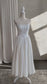 Tea-Length Wedding Reception Dress with Basque Waistline and Satin Bodice